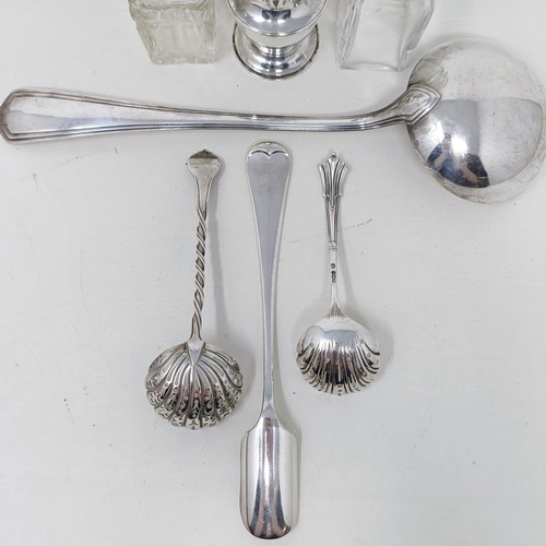 1 - A George V silver sugar sifter, two sifter spoons, various dates and marks, 5.8 ozt, a silver plated... 