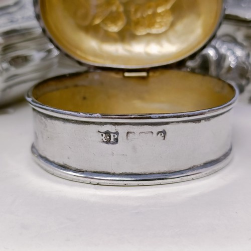 13 - A Continental silver coloured metal shaped box, top inset with a hardstone, and two silver boxes (3)