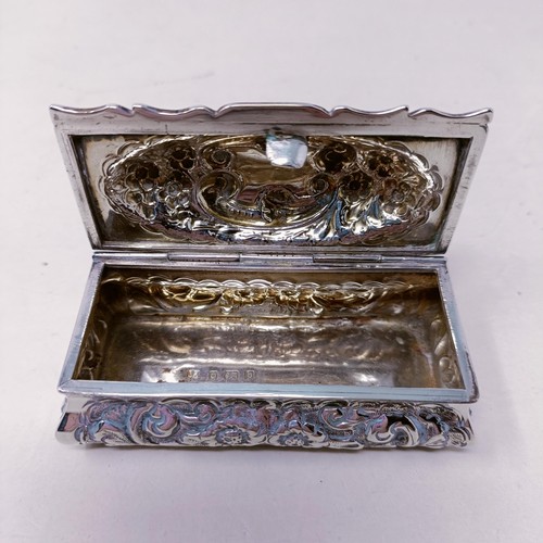 13 - A Continental silver coloured metal shaped box, top inset with a hardstone, and two silver boxes (3)