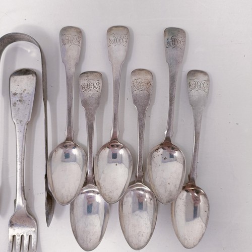 14 - A pair of silver sugar tongs, and assorted silver spoons, 9.4 ozt