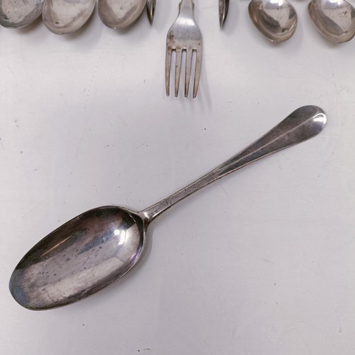 14 - A pair of silver sugar tongs, and assorted silver spoons, 9.4 ozt