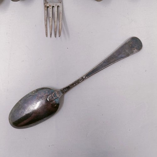 14 - A pair of silver sugar tongs, and assorted silver spoons, 9.4 ozt