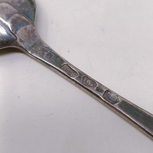 14 - A pair of silver sugar tongs, and assorted silver spoons, 9.4 ozt