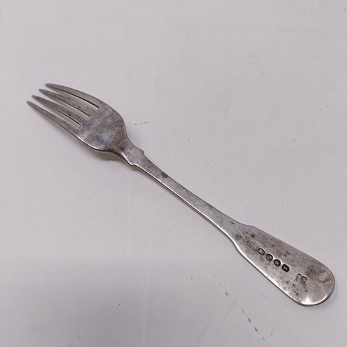 14 - A pair of silver sugar tongs, and assorted silver spoons, 9.4 ozt