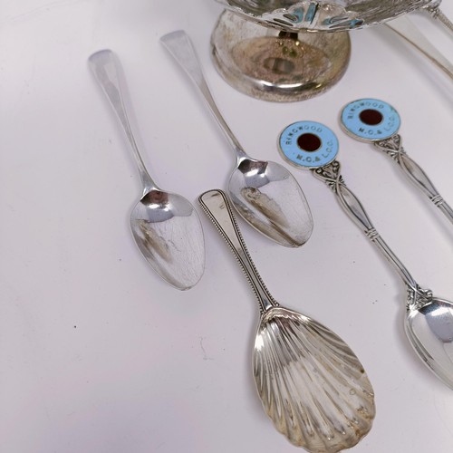 15 - A pair of silver and enamel teaspoons, a finial reading Ringwood M.C & L.C.C, other spoons and a taz... 