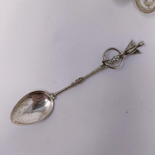 15 - A pair of silver and enamel teaspoons, a finial reading Ringwood M.C & L.C.C, other spoons and a taz... 