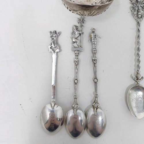 20 - A silver sifter spoon, two others, and a set of Continental silver coloured metal coffee spoons, var... 