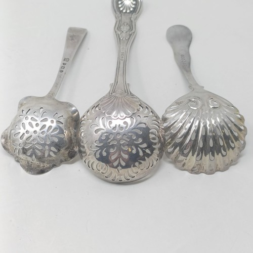 20 - A silver sifter spoon, two others, and a set of Continental silver coloured metal coffee spoons, var... 