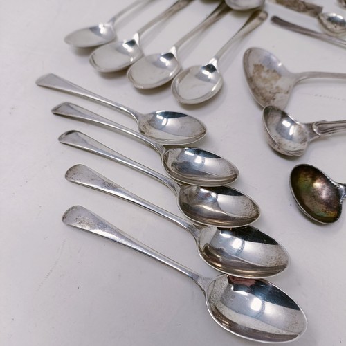 26 - A pair of silver sugar tongs, and assorted other silver spoons, various dates and marks, 8.9 ozt