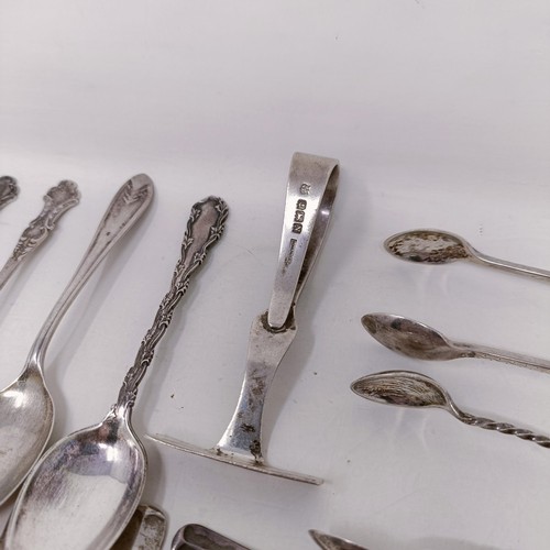 26 - A pair of silver sugar tongs, and assorted other silver spoons, various dates and marks, 8.9 ozt