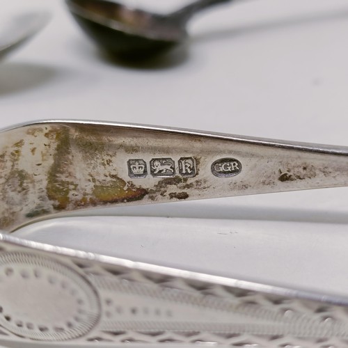 26 - A pair of silver sugar tongs, and assorted other silver spoons, various dates and marks, 8.9 ozt