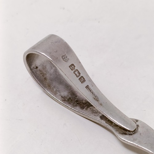 26 - A pair of silver sugar tongs, and assorted other silver spoons, various dates and marks, 8.9 ozt