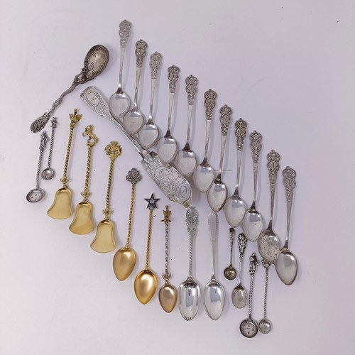 47 - A silver fiddle pattern fish knife, assorted silver and silver coloured metal spoons