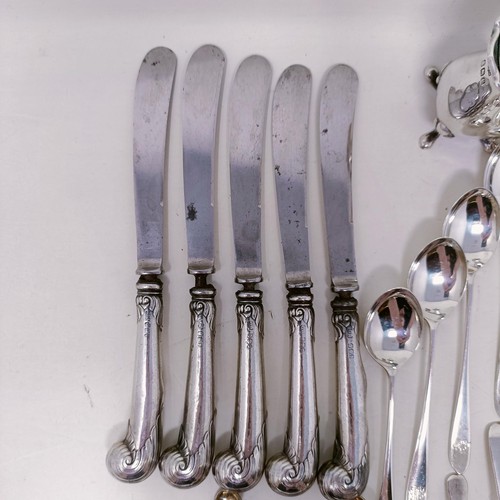 51 - Two silver pepperpots, a set of four silver salts, assorted spoons and other items, various dates an... 