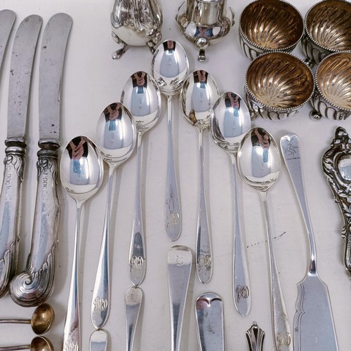 51 - Two silver pepperpots, a set of four silver salts, assorted spoons and other items, various dates an... 