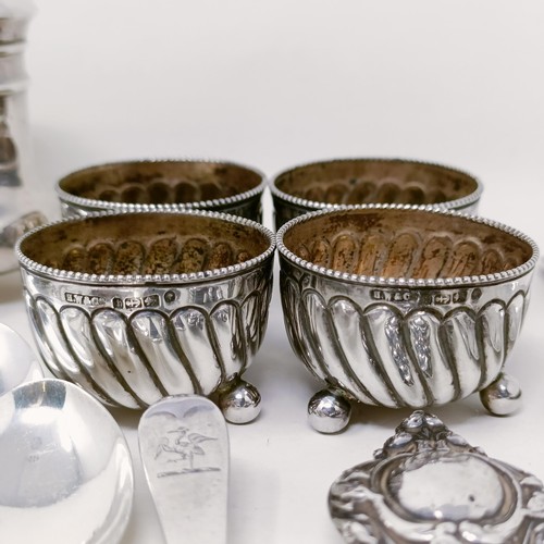 51 - Two silver pepperpots, a set of four silver salts, assorted spoons and other items, various dates an... 