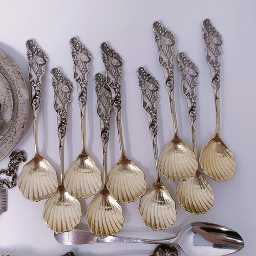 62 - A set of six Continental silver coloured metal teaspoons, and assorted other items