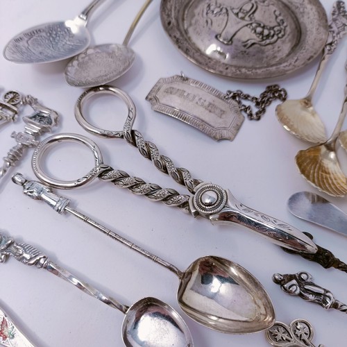 62 - A set of six Continental silver coloured metal teaspoons, and assorted other items