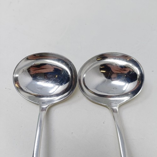 82 - A pair of late Victorian silver Old English pattern sauce ladles, Sheffield 1901, and two other sauc... 