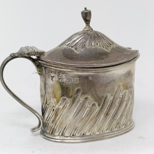 52 - A George V silver hip flask, an oval mustard pot, a fork and a spoon, 7.6 ozt, and an Indian silver ... 