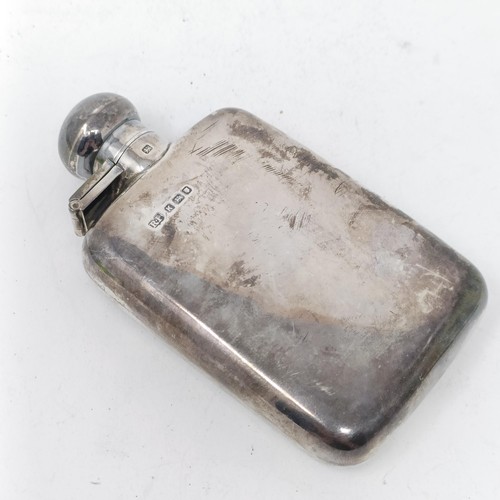 52 - A George V silver hip flask, an oval mustard pot, a fork and a spoon, 7.6 ozt, and an Indian silver ... 