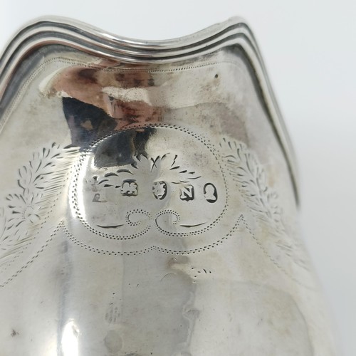 66 - A George III silver cream jug, and a George V silver cream jug, 5.8 ozt (2)