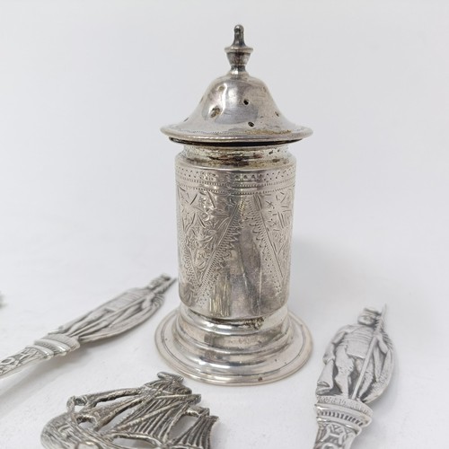 67 - A Contintenal silver coloured metal spoon, with a ship finial, a pepper pot and assorted spoons