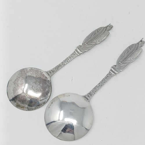 67 - A Contintenal silver coloured metal spoon, with a ship finial, a pepper pot and assorted spoons