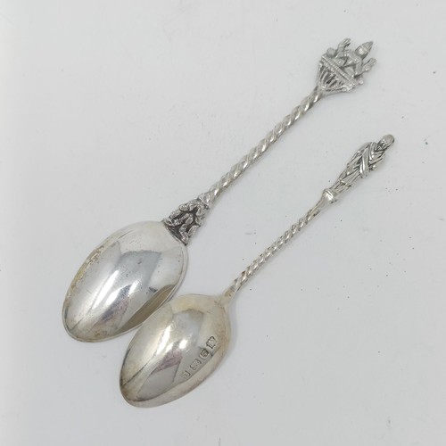 67 - A Contintenal silver coloured metal spoon, with a ship finial, a pepper pot and assorted spoons