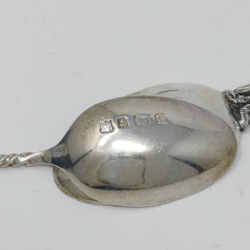 67 - A Contintenal silver coloured metal spoon, with a ship finial, a pepper pot and assorted spoons