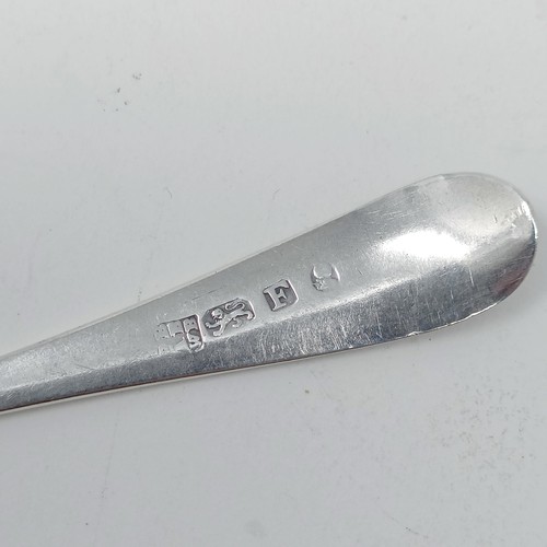 67 - A Contintenal silver coloured metal spoon, with a ship finial, a pepper pot and assorted spoons