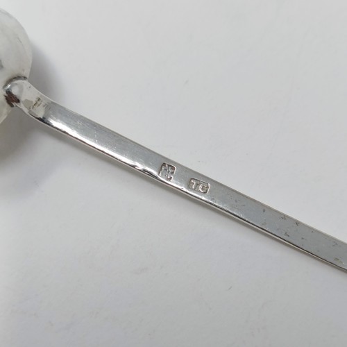 74 - A Continental silver coloured metal caddy spoon, with a goat finial, and assorted other spoons