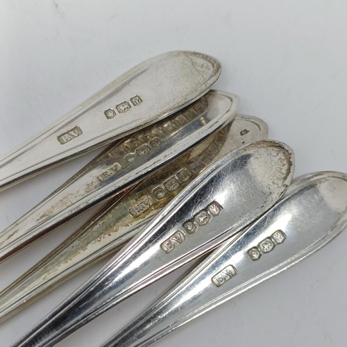 74 - A Continental silver coloured metal caddy spoon, with a goat finial, and assorted other spoons