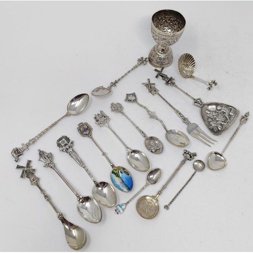 80 - A Continental silver coloured metal caddy spoon, various novelty spoons and forks, and an Indian sil... 