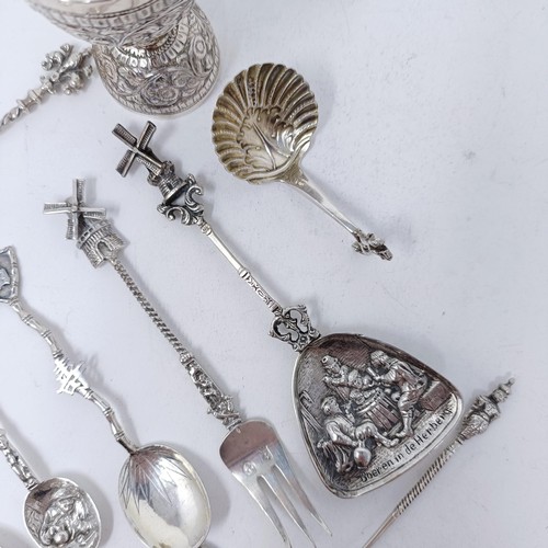 80 - A Continental silver coloured metal caddy spoon, various novelty spoons and forks, and an Indian sil... 