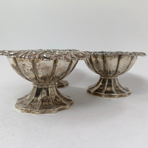 84 - A set of three Victorian silver pedestal salts, marks rubbed, 10.6 ozt