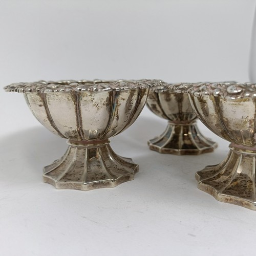 84 - A set of three Victorian silver pedestal salts, marks rubbed, 10.6 ozt