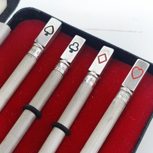 90 - A set of four sterling silver bridge pencils, cased