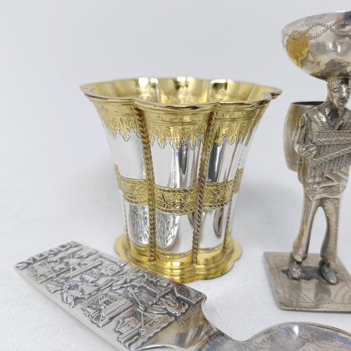 93 - A Danish silver cup, 2.4 ozt, two silver coloured metal servers, and a silver coloured metal figure ... 