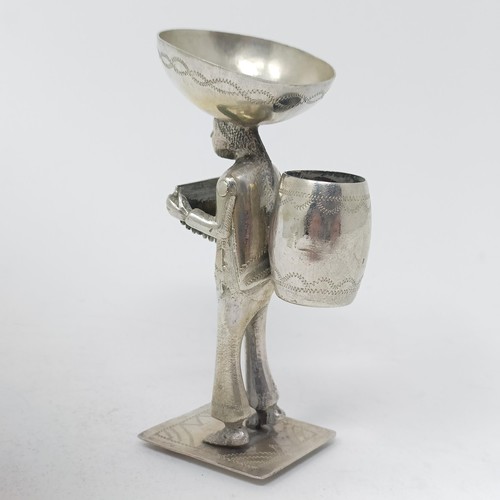 93 - A Danish silver cup, 2.4 ozt, two silver coloured metal servers, and a silver coloured metal figure ... 