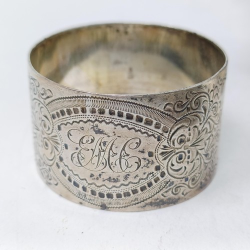 109 - A George V silver pierced bowl, a napkin ring, a  silver dish, three pairs of sugar tongs, 7.9 ozt