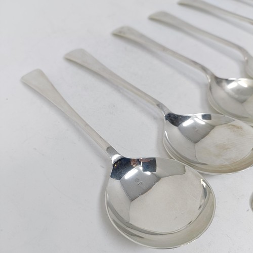 126 - A set of six Elizabeth II silver old English pattern soup spoons, and a table spoon, Sheffield 1955