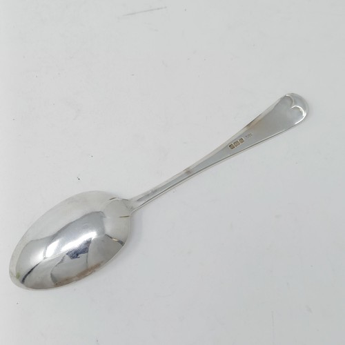 126 - A set of six Elizabeth II silver old English pattern soup spoons, and a table spoon, Sheffield 1955