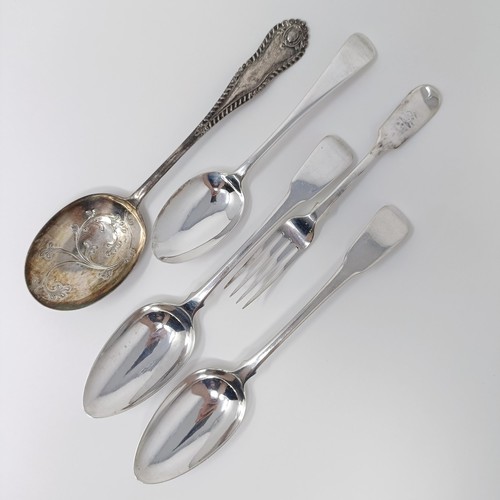 131 - A pair of George II silver fiddle pattern table spoons, two other spoons and a fork, various dates a... 