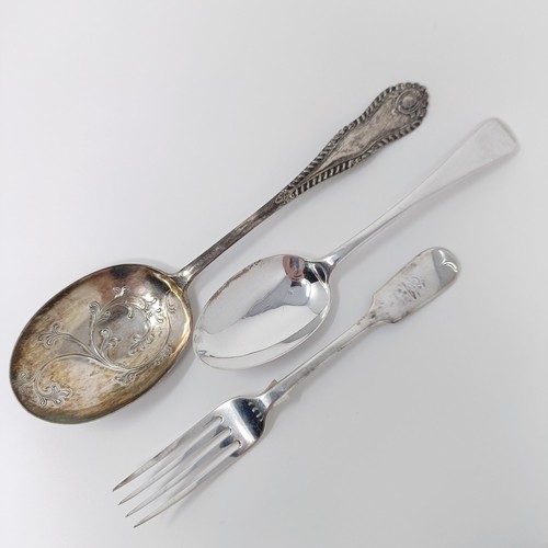 131 - A pair of George II silver fiddle pattern table spoons, two other spoons and a fork, various dates a... 