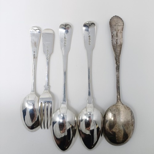 131 - A pair of George II silver fiddle pattern table spoons, two other spoons and a fork, various dates a... 