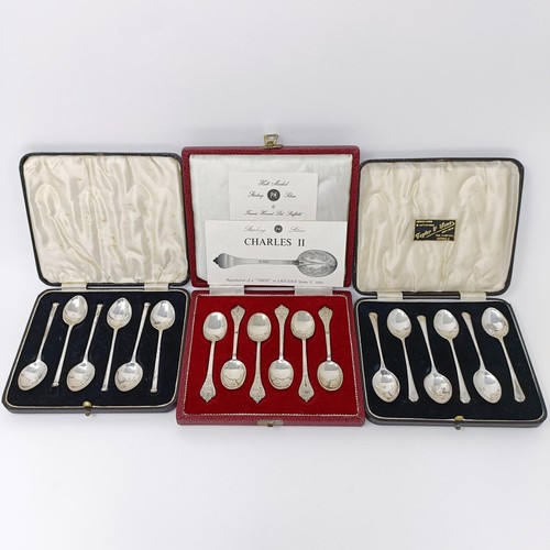 143 - A set of six George V teaspoons, and two other sets, all cased, 4.1 ozt