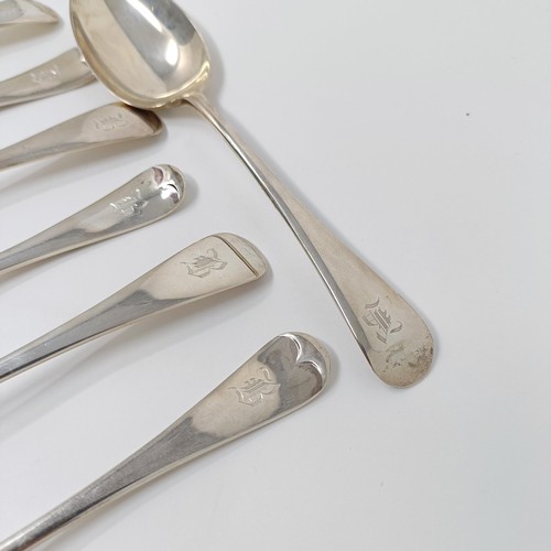 146 - A set of seven George V silver Old English pattern dessertspoons, and a set of six matching dessert ... 