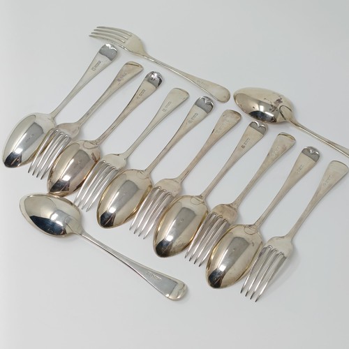 146 - A set of seven George V silver Old English pattern dessertspoons, and a set of six matching dessert ... 