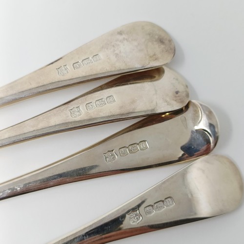 146 - A set of seven George V silver Old English pattern dessertspoons, and a set of six matching dessert ... 